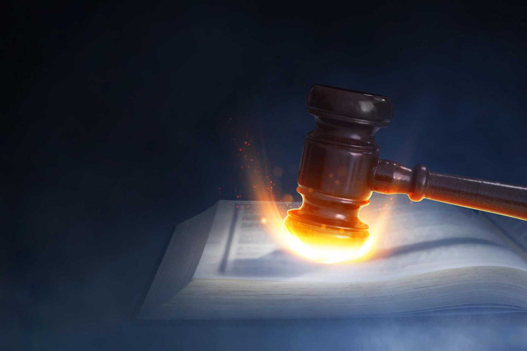Image of a flaming gavel.