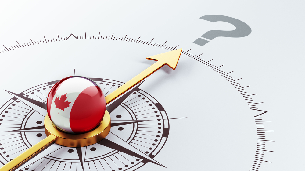 Abstract image of a compass featuring the Canadian flag.