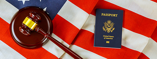 U.S. citizenship - American flag and passport with gavel - naturalization and denaturalization