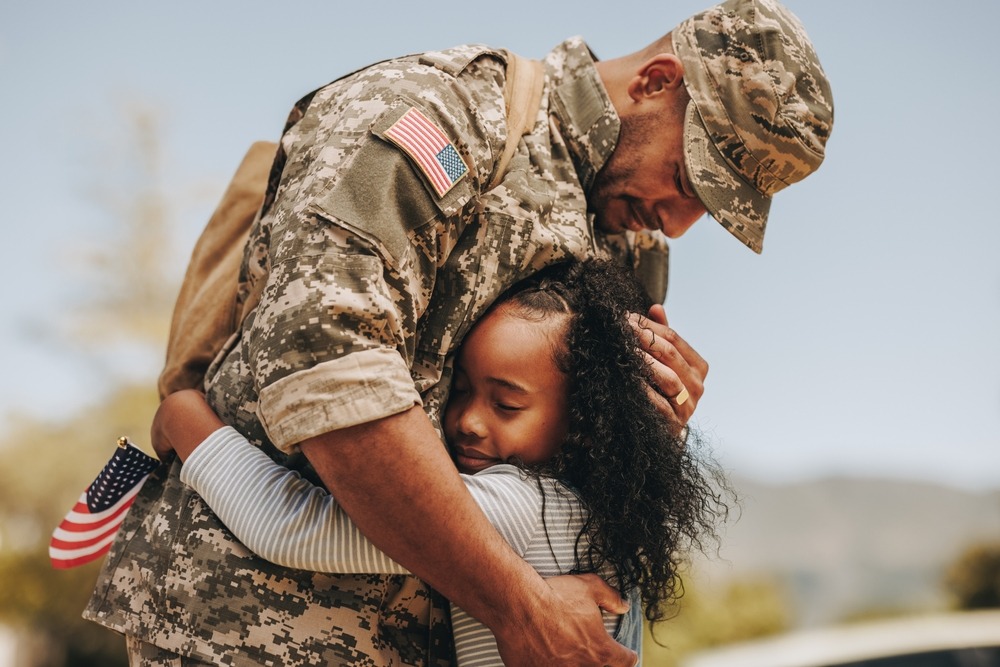 Image of a military family hugging.