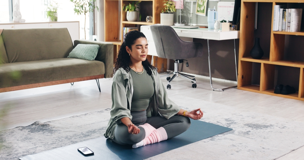Image of a woman doing yoga.